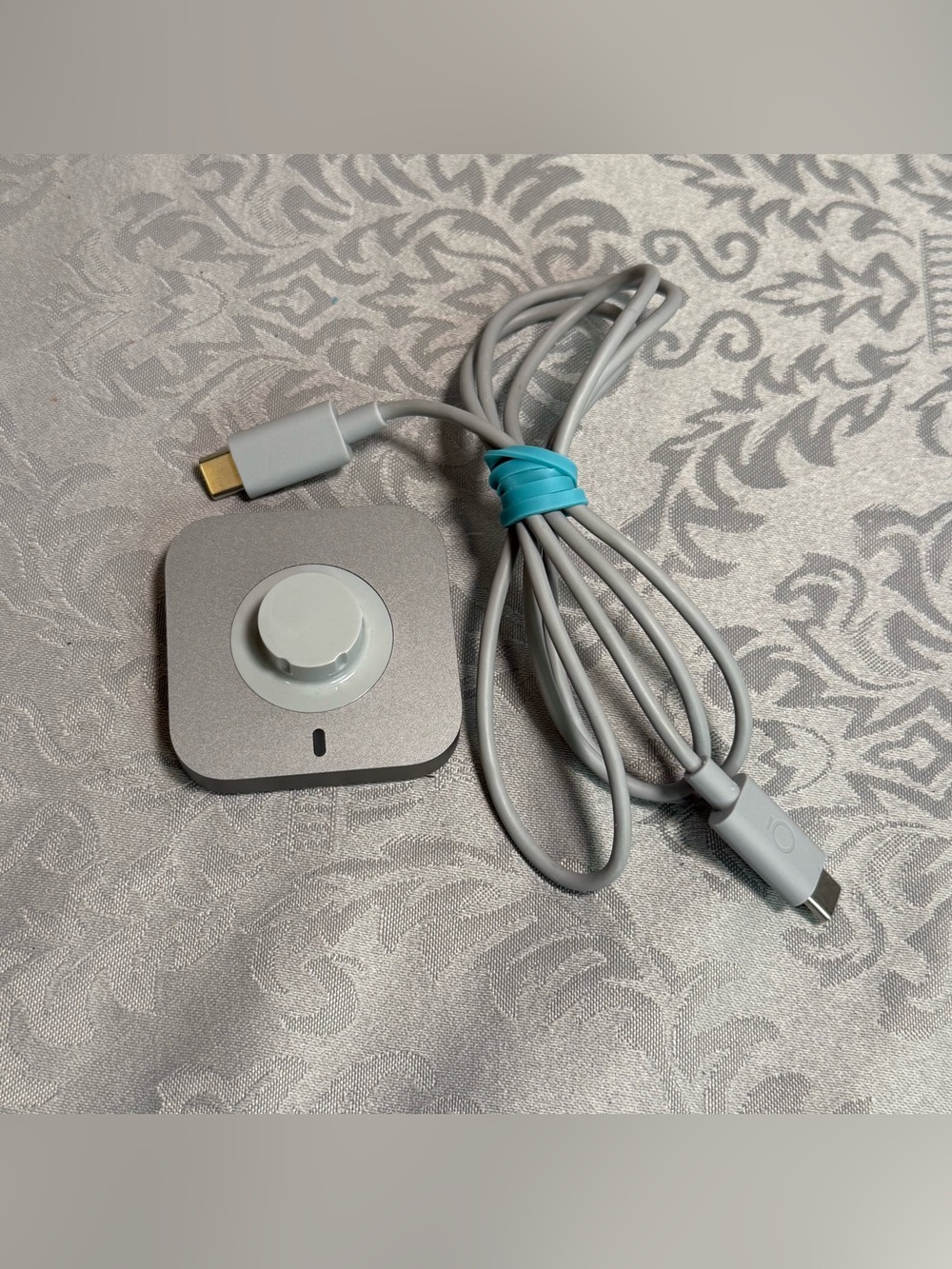 Oura Silver Magnetic Charger with Gray Cable